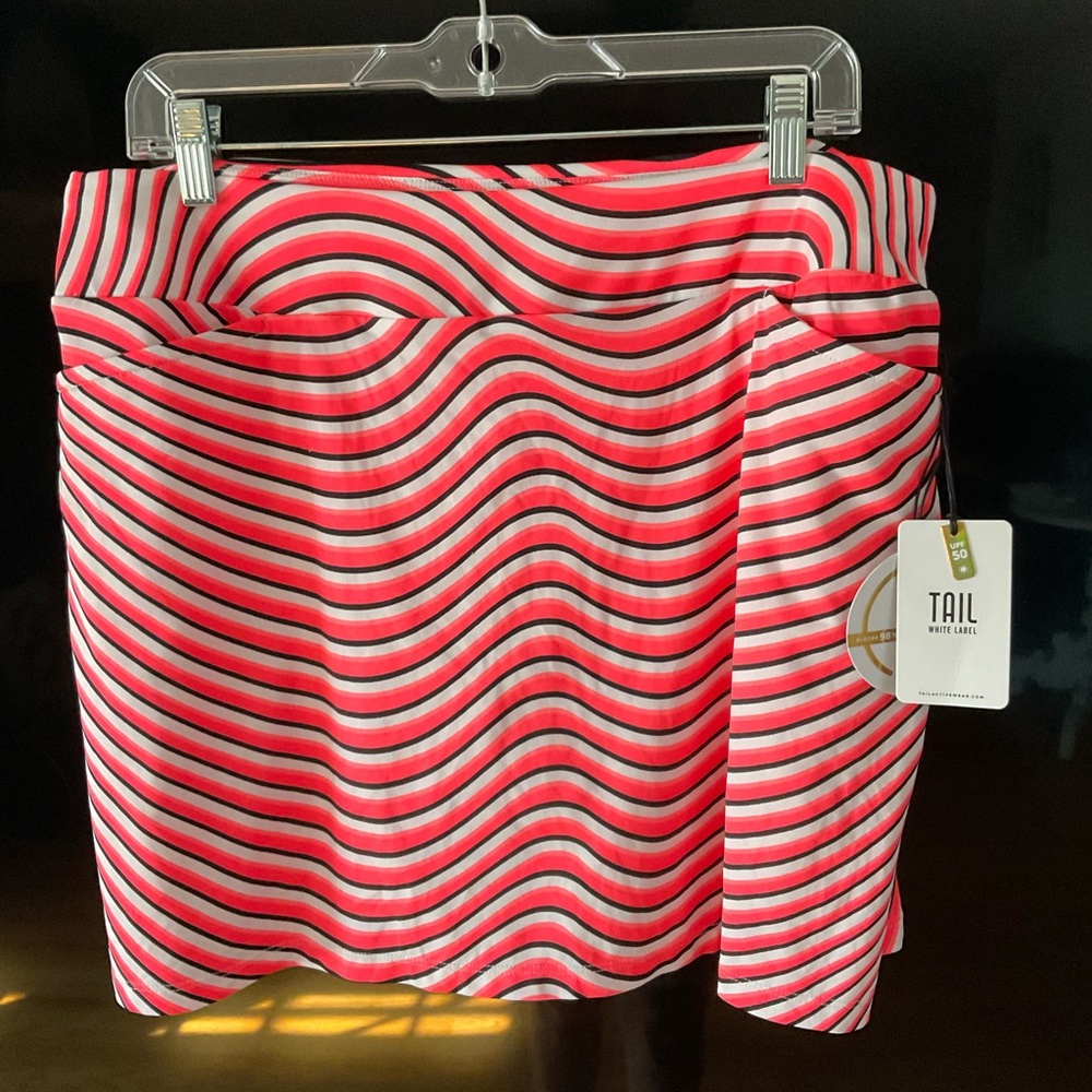 Tail Wavy Striped Skort in orange and Black; great for golfing